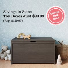 a toy box sitting on top of a wooden floor next to a basket and stuffed animals