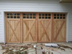 My cell 828-220-4101. Please call, text or email me. Would love to chat. These are real wooden garage doors made by hand out of solid Cedar. We take a lot of pride in what we do and love making creations of Art. Solid Cedar Doors - Door prices are in the raw. Added options: windows, stain, black decorative hardware, are priced below the sizes. Shipping is based on the quantity of doors and zip code of the city and state they are shipped to. 1. 16'x 7' = 3675 2. 16' x 8' = 4000 3. 18' x 8' = 4325 Cedar Garage Door, Custom Wood Garage Doors, Cedar Door, Wooden Garage Doors, Custom Garage Doors, Wood Garage, Overhead Garage Door, Wood Garage Doors, Overhead Garage