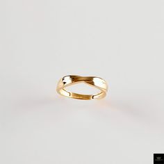 Celebrate Timeless Elegance with Our Gold Infinity Twist Ring Discover the beauty of simplicity and symbolism with our Gold Infinity Twist Ring. This dainty, handcrafted ring features a sleek twist design, symbolizing infinity and everlasting bonds. Made from certified solid gold, its minimalist aesthetic makes it a versatile accessory for both everyday wear and special occasions. Whether you're searching for a wedding gift, engagement gift, or a thoughtful Christmas gift for her, the Gold Infin Thoughtful Christmas Gifts, Twist Ring, Christmas Gift For Her, Handcrafted Rings, Engagement Anniversary, Minimalist Aesthetic, Christmas Gifts For Her, Ring For Women, Engagement Gifts