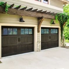 two brown garage doors with plants growing on the side of them and attached to a pergolated trellis