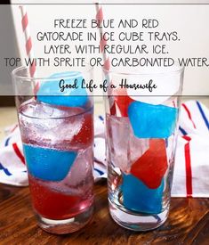 two glasses filled with ice next to each other on top of a wooden table in front of an american flag napkin