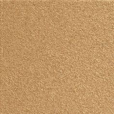 a close up view of a tan colored carpet