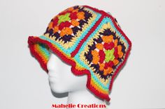 Colorful crochet hat, multicolor crocheted hat for women, sun spring hat, boho hippie hat, handmade crochet hat, granny square hat ALL MY DESIGNS ARE PROUDLY HANDCRAFTED IN SOUTH FLORIDA. EACH PIECE IS UNIQUE AND NEVER DUPLICATED! PLEASE READ DESCRIPTION CAREFULLY. I AM DOING MY BEST TO DESCRIBE THIS ITEM AS ACCURATELY AS POSSIBLE. PLEASE CONTACT ME IF YOU HAVE ANY QUESTIONS My mom taught me crochet when I was a little girl and enjoy tremendously creating beautiful hats and list them for you in Handmade Colorful Crochet Hat For Beach, Beach Hats With Granny Square Yarn, Granny Square Yarn Hats For Beach, Beach Bucket Hat With Granny Square Crochet, Beach Crochet Bucket Hat With Granny Square, Granny Square Crochet Bucket Hat For Beach, Handmade Multicolor Crochet Hat In Hippie Style, Multicolor Granny Square Hats For Beach, Handmade Multicolor Crochet Hippie Hat