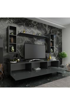 an entertainment center with black marbled walls and shelves