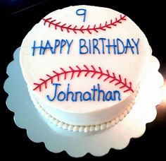 a birthday cake that has a baseball on it