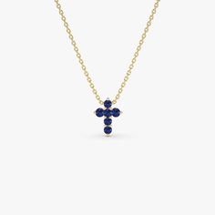 Presenting our 14K Gold Blue Sapphire Mini Cross Necklace, featuring 0.25 ctw of sapphires in a refined and graceful design. This dainty necklace, adorned with the September birthstone, is perfect for everyday elegance and meaningful occasions. Perfect as a graduation gift, it merges religious symbolism with a modern, minimalist style. Carefully crafted, this piece offers timeless beauty with a personal and meaningful touch. ▶Item Details * Gold Kt: 14K * Custom Gold Color: Rose Gold, Yellow Gold, White Gold * Length & Width: 9.75x7.25MM * Round Sapphires: 6 Pcs 1.9 MM * Total CTW: 0.25 * Setting Type: Prong Setting * Ready to Ship in 1-2 Business Days ▶ See more of our Sapphire Jewelry - https://etsy.me/3JDo6hp ▶ See our storefront here - http://etsy.me/2lUcVnH  ▶ All store sections here September Birthstone Necklace, Round Sapphire, Gold Armband, Mini Cross, Necklace Minimalist, Ruby Jewelry, September Birthstone, Emerald Jewelry, Sapphire Jewelry