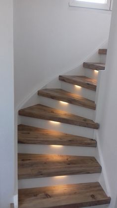 some wooden stairs with lights on them