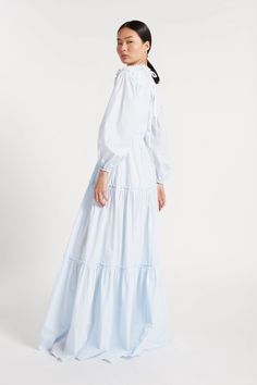 Long pale blue and white fine stripe cotton dress with built in slip. Ruffled tie neck, ruffled sleeve detail with elastic cuff, open back and tiered. Gathered skirt. Duchess Satin, Silk Taffeta, Couture Details, Gathered Skirt, Circle Skirt, Funnel Neck, Tie Neck, Sleeve Detail, Cotton Dress