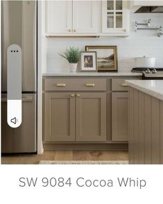 a kitchen with white cabinets and silver appliances in the center is featured on an instagram page