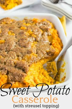 sweet potato casserole with streusel topping in a white dish on a table