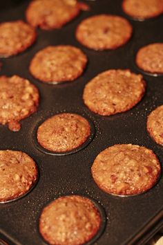 muffins are sitting in the pan ready to be baked into the oven for consumption