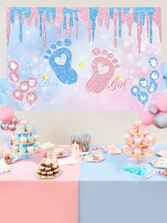 a baby shower party with pink and blue decorations