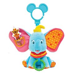 an elephant toy with a mickey mouse on it's back and ears hanging from the handle