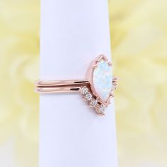 ◈ Diamond Fine Jewelry ◈ ◈ Item Details ◈ << Engagement Ring >> --- Handmade in United States --- Made to Order --- Metal: Solid 14K Gold ( White, Rose, Yellow Gold ) --- Band Width : 1.5 mm --- Center Stone : Natural Marquise Opal --- Center Stone Size : 10x5 mm --- Center Stone Carat Weight : Approx 0.75 ct << Matching Band >> --- Band Width : 1.5 mm --- 100% Real Natural High Quality Diamond --- Non-Conflict Diamonds --- Diamond Shape : Round --- Diamond Cut Grade : Ve Opal Diamond Engagement Ring, Matching Ring Set, Opal Engagement Ring Set, Opal Wedding Rings, Opal Engagement, Engagement Rings Opal, Natural High, Diamond Engagement Ring Set, Bridal Bands