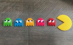 pac - man beads are lined up on a table