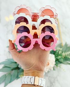 The CUTEST flower shaped sunglasses for your sweet Flower girl! These are the perfect way to ask your Flower Girl to help you on your special day or to gift to her as a thank you gift on the wedding day! With your purchase you receive: 1 Pair of Flower Sunglasses (white, pink, orange or translucent!) A name personalized on the side of the glasses! THE LOVE LEIGH GIFT PROMISE: We guarantee our products and ensure that you will be 100% happy with your purchase! Please see our testimonial section a Aesthetic Sunglasses, Funky Sunglasses, Flower Sunglasses, Thank You Flowers, Name Label, Cute Sunglasses, Girl Flower, Shaped Sunglasses, Fashion Eye Glasses