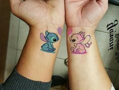 two people with matching tattoos on their wrists, one has an elephant and the other has a dog