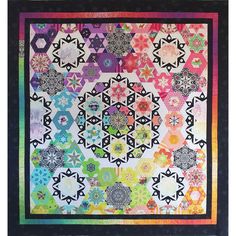 a colorful quilt with many different designs on the front and back, along with black border