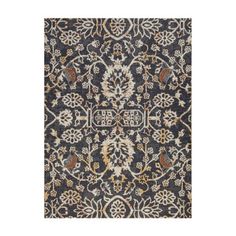 a rug with an ornate design on the front and back side, in grey tones