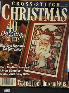 the cover of cross stitch christmas magazine