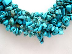 Designer Gemstone Jewelry - This is a wide blue turquoise nugget collar necklace. It has a hanging tag for Premier Designs, is 1" wide and 22.5" long, which includes the 3" extension. Collectible Blue Turquoise Gemstone Necklace, Turquoise Nugget Necklace, Multicolor Hand-strung Turquoise Necklace Gift, Luxury Turquoise Nickel-free Necklaces, Artisan Blue Multi-stone Turquoise Necklace, Rhinestone Statement Necklace, Turquoise Bead Necklaces, White Pearl Necklace, Dress Clip