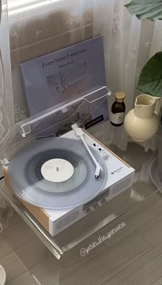 a record player sitting on top of a table