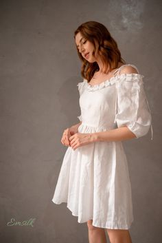 "This design linen dress is perfect for work and casual events. 100 % designed and handmade by Emsilk. I am pleased to offer your garments made to measure at no extra cost. * Detail: - Off shoulder with ruffles and tied straps - Gathered on waist - Puffed 3/4 sleeves - Fully lined - Invisible zipper on the back - Above the knee length (send me a request on the length) - High quality Premium white linen, washed linen, soft linen - The model is 5'6\" tall and wearing size S. * Care: - Dry clean or Dress Bridesmaids, Linen Dress Summer, White Linen Dress, White Linen Dresses, Baby Doll Dress, Linen Dresses, Dress Summer, Babydoll Dress, Mulberry Silk