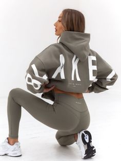 Blakely Clothing Isabel Oversized Womens Hoodie - Safari Green | Free delivery on orders over $199 Oversized Long Sleeve Activewear With Kangaroo Pocket, Oversized Hoodie With Drawstring Hood For Workouts, Oversized Hoodie With Drawstring For Workout, Oversized Workout Hoodie With Drawstring Hood, Oversized Athleisure Activewear With Kangaroo Pocket, Oversized Hoodie For Workout In Fall, Oversized Cozy Hoodie Activewear, Oversized Cozy Hooded Activewear, Cozy Oversized Hoodie Activewear