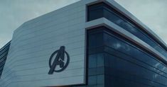 the avengers logo is on the side of a building