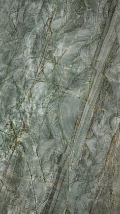 an abstract marble pattern with brown and green colors