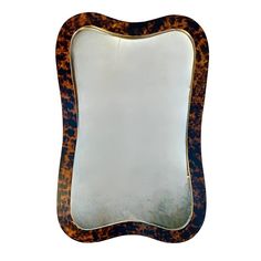 an animal print mirror is shown against a white background