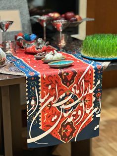 a table topped with plates and bowls filled with food