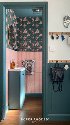 This sleek cloakroom is a gorgeous example of bold and kitsch home design. Green Cloakroom, Manifesting House, Glasgow Apartment, Bathroom Palette, Real Bathrooms, Strawberry House, Black Cabinets Bathroom, Furniture Color Schemes