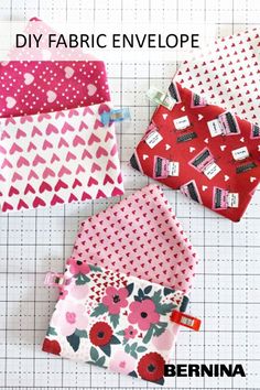 four fabric envelopes with hearts and flowers on them, all in different colors are shown