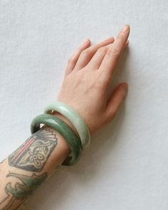 Beautiful Jade bangle! Color and tone vary due to the nature of the natural stone. Vintage Bangle Bracelet With Natural Stones, Spiritual Green Bangle Cuff Bracelet, Jade Gemstone Bangle Bracelet, Green Gemstone Bangle Cuff Bracelet, Jade Accessories, Arm Bangles, Hippie Style Clothing, Bangles Making, Kawaii Accessories