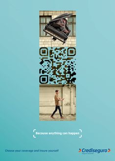 a man walking past a building with a qr code on the side of it