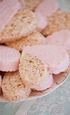 a bowl filled with crackers and ham on top of a table