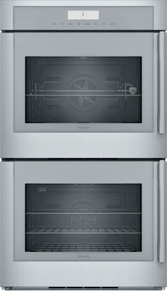 two stainless steel ovens side by side