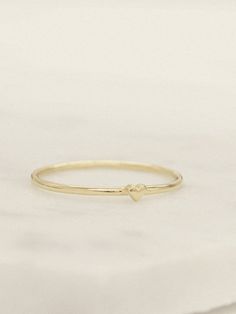 Don't wear your heart on your sleeve - wear it on your finger, shh..it's our little secret. Our Teeny Tiny Heart Ring is handcrafted in solid 14K gold in 1.15 mm width, lightweight and durable. Heart On Your Sleeve, Tiny Heart, Solid Gold Rings, Heart On, Wear It, Heart Ring, Solid Gold, Gold Rings, Yellow Gold