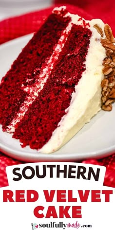 a slice of red velvet cake with white frosting and pecans on the side