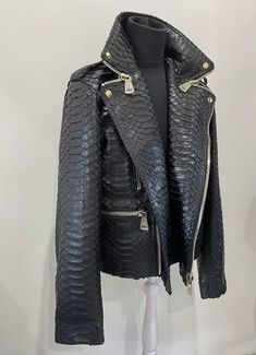 DRAGON and KING SNAKESKIN BIKER JACKET FOR MANThis jacket was made of KING (DRAGON) python leather.Glossy finish.This type of leather is very rare and more expensive than other types.This leather has the biggest flakes among all types of python leather.PREMIUM QUALITYLUXURY STYLEOutside: GENUINE KING and DRAGON PYTHON LEATHER Accessories: Golden color,  SERGIO STEFANO, Italy *All our products are 100% handmade, we always try to create interesting ideas to make your style unique.*We use only the King Dragon, Python Jacket, Husband Fashion, Jacket For Man, Leather Jacket For Men, Black Python, Best Leather Jackets, All Black Fashion, Weird Fashion