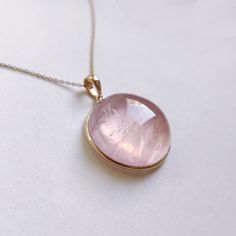 This stunning pendant is set in 14k Solid Yellow Gold with Natural Rose Quartz with utmost precision. It is an unique gemstone pendant for nearly every occasion and is completely hassle-free jewelry. 🔷ABOUT GEMSTONE:  Rose quartz is often called the "Stone of Love" and is believed to promote all forms of love, including self-love, romantic love, and love for others. It can help individuals open their hearts to love and develop a greater sense of compassion and empathy. Rose quartz is often call Round Rose Quartz Birthstone Jewelry, Pink 14k Gold Jewelry With Polished Finish, Pink Gold Necklace With Polished Finish For Gift, Pink Gold Gemstone Necklace For Anniversary, Rose-colored 14k Gold Round Jewelry, Rose Gold Cabochon Pendant Jewelry, Rose 14k Gold Round Jewelry, Pink Round Cabochon Necklace, Anniversary Pink Gold Gemstone Necklace