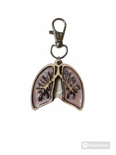 a keychain with an image of the lungs