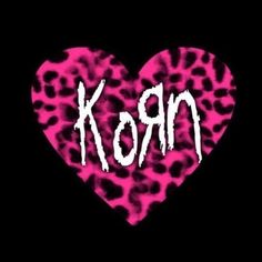 a pink heart with the word korn written in white ink on top of it