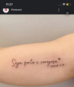 a person with a tattoo on their arm that says, say fortee canoga