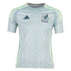 the new adidas jersey is shown in light blue and white with green trims