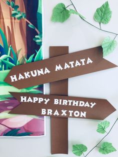 a sign that says hakuna matata and happy birthday braxton on it