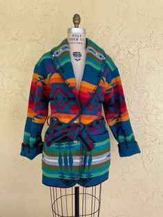 "Vtg Pendleton Multi Color Jacket/Coat - Wrap style with Front Patch Pockets and Matching Belt ONLY ONE AVAILABLE FOLLOW me on INSTAGRAM for First Looks & Previews @LoveRocksVintage @LoveRocksModern LOVE ROCKS MODERN ITEM DETAILS & DESCRIPTION . Beautiful Pendleton Blanket Native, Western Design . Super bright & bold colors . Wrap Style . Front Patch Pockets . Sleeves can be cuffed . Button Front Label: Pendleton Size: - this can find bigger sizes - refer to measurements - NO RETURNS FOR NOT FIT Vintage Long Sleeve Outerwear For Rodeo, Vintage Shawl Collar Outerwear For Fall, Retro Long Sleeve Outerwear For Rodeo, Pendleton Coat, Wardrobe Plan, Vintage Western Wear, Pendleton Blanket, Western Aztec, Pendleton Jacket