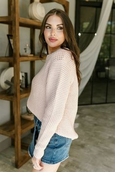 The Elizabeth Blush Waffle Knit Sweater is a soft and feminine staple for your cooler weather wardrobe. Made from light blush pink waffle knit fabric, this sweater offers both comfort and style. The round neckline and long sleeves create a classic silhouette, while the ribbed hem adds a polished finish. Perfect for layering or wearing on its own, the Elizabeth sweater is versatile enough for casual days or cozy evenings out. Elizabeth Sweater, Soft And Feminine, Light Blush Pink, Waffle Knit Sweater, Cooler Weather, Classic Silhouette, Waffle Knit, Round Neckline, Blush Pink