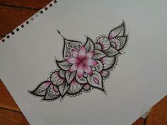 a drawing of a pink flower on white paper